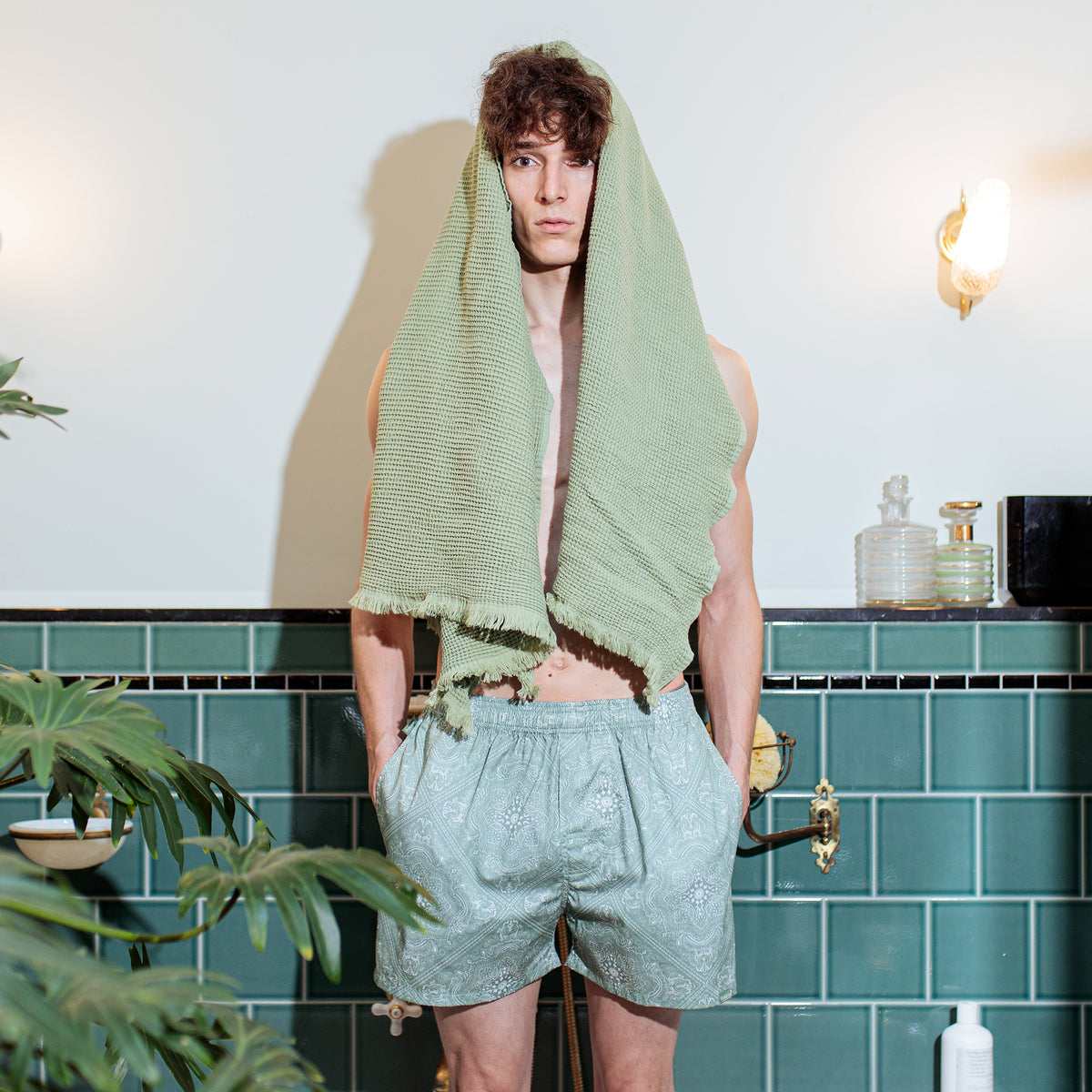 Model wearing green Paisley boxer shorts by Pockies